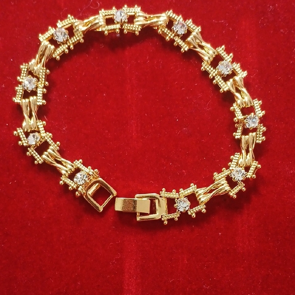 Elegant Gold Bracelet with Silver Accents - Picture 1 of 6